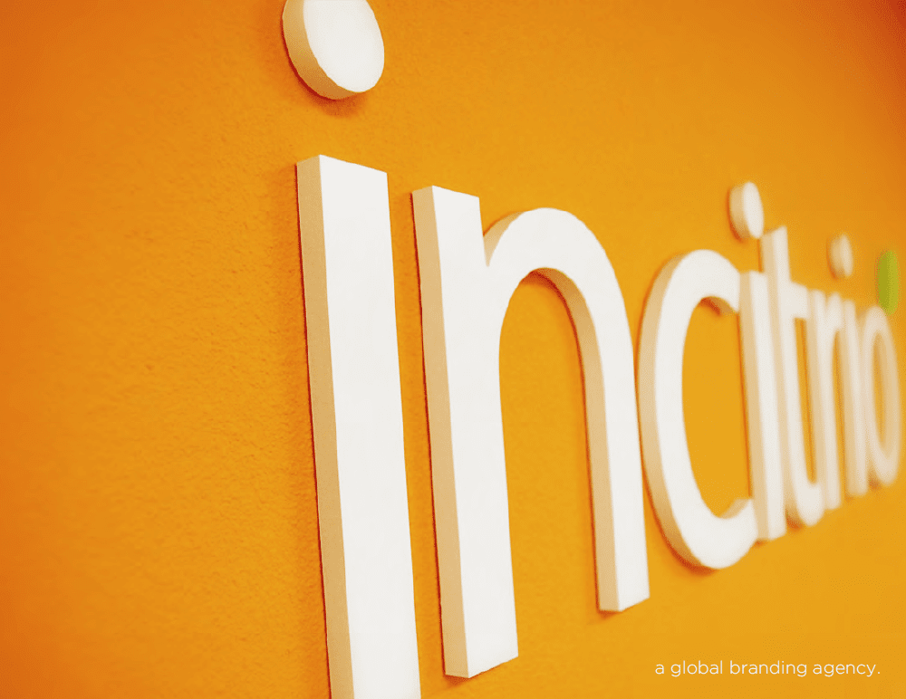 Incitrio Branding & Marketing Agency Presentation - Before & After Incitrio Branding & Marketing Agency Logo on Wall