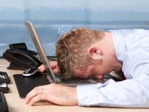 730106-business-man-laptop-tired