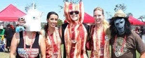 People dressed in bacon costumes