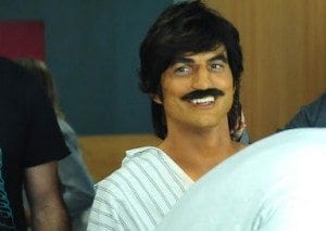 Ashton Kutcher in offensive makeup.