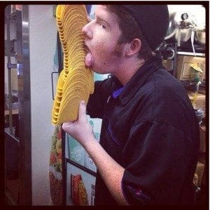 Employee licking food.